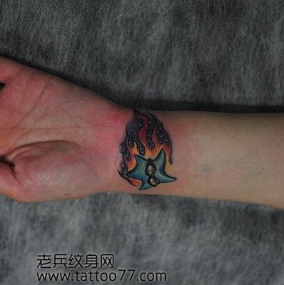 手臂海星火焰纹身图片