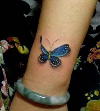 女人喜欢的手臂彩色蝴蝶纹身图片