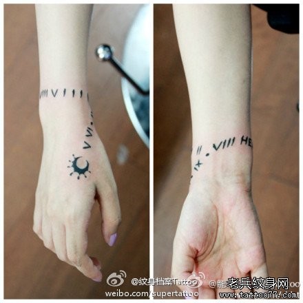 女人手腕一幅字母手链纹身图片