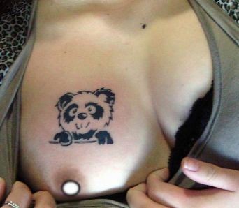 胸部纹身图片：胸部图腾熊猫纹身图片纹身作品