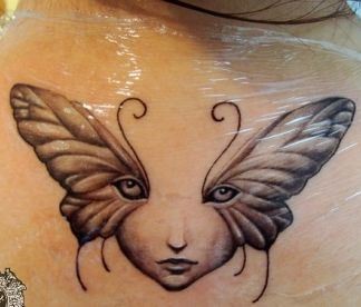 颈部纹身图片：蝴蝶翅膀精灵纹身图片纹身作品
