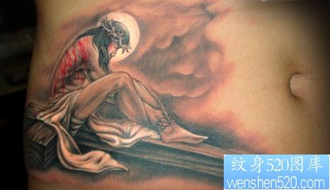 腹部纹身图片：腹部耶稣十字架纹身图片纹身作品