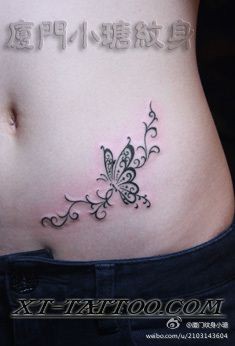女孩子腹部精美好看的图腾蝴蝶藤蔓纹身图片