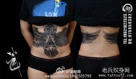 女人腹部超帅潮流的猫头鹰纹身图片