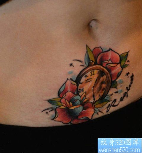 纹身520图库推荐一幅女人腹部彩色花纹身图片