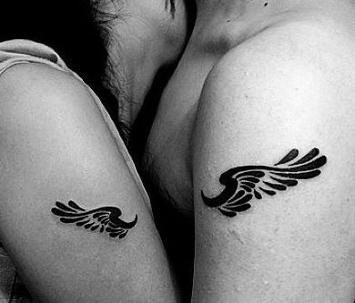 情侣纹身图片：手臂情侣翅膀图腾纹身图片纹身作品
