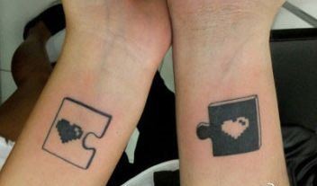 手臂情侣爱心拼图游戏纹身图片