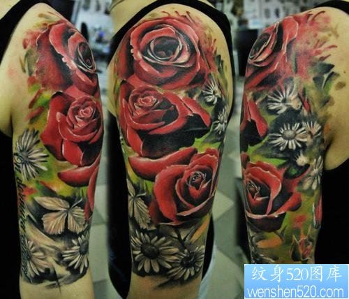 一幅胳膊彩色玫瑰花纹身作品