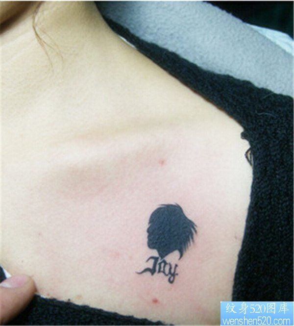 一幅女生胸前头像纹身图案