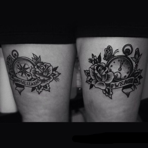 女性腿部玫瑰时钟刺青