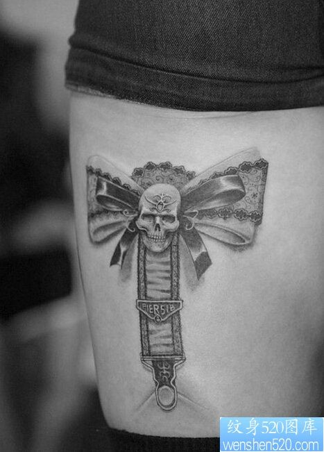 纹身推荐一款女性腿部骷髅头蝴蝶结纹身图案