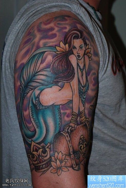 一款大臂美人鱼纹身图案