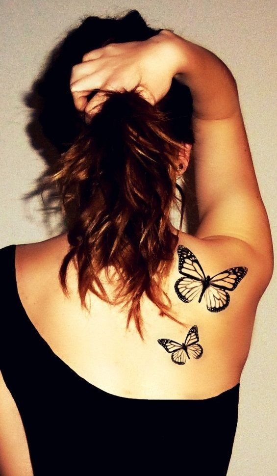 女性背部漂亮的纹身图案
