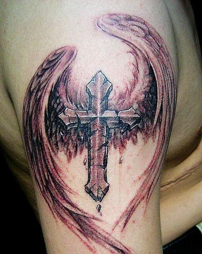 手臂上一款帅气的十字架纹身