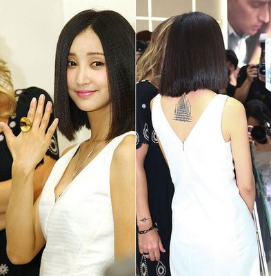 张歆艺穿白色仙女裙子展示背部漂亮的纹身