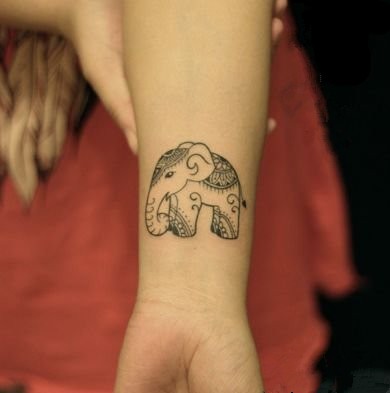可爱的小动物女生手臂纹身