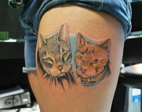 可爱的猫咪女生大腿纹身
