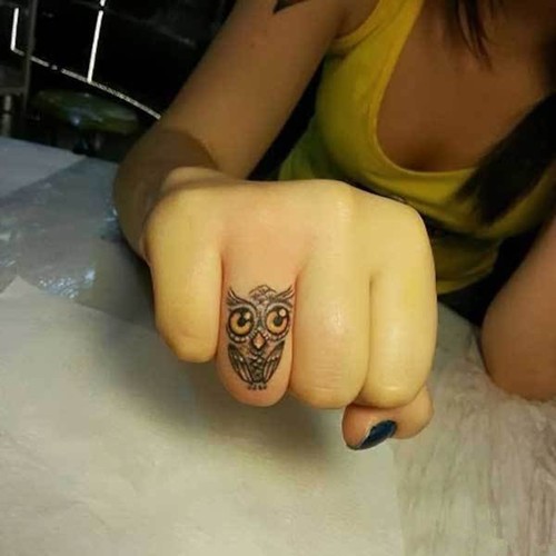 手指上的动物图案纹身