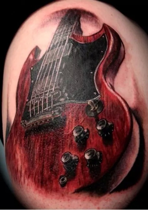 时尚大臂吉他纹身