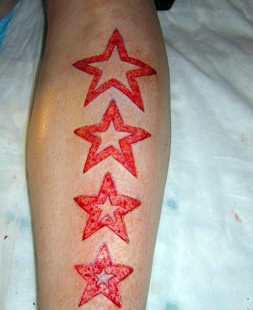 令人毛骨悚然的割肉、肉雕纹身图片