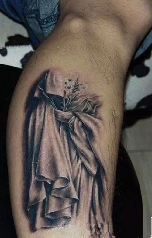 腿部另类死亡之神纹身