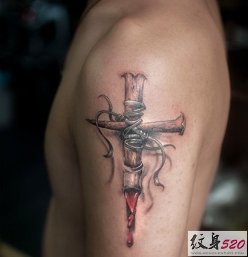 手臂经典十字架纹身图片