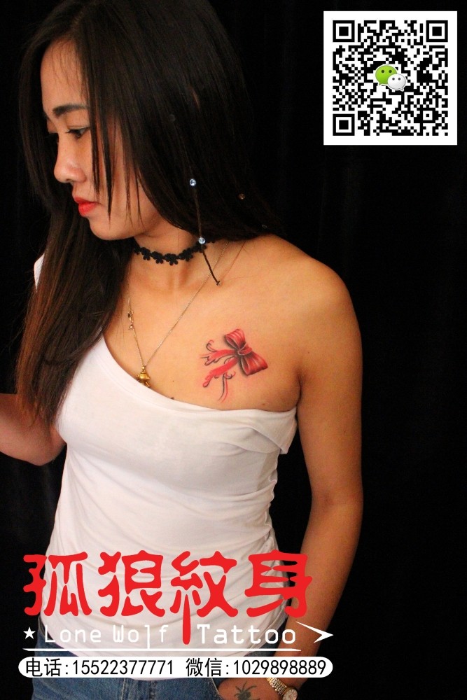 美女性感胸部3D立体蝴蝶结纹身 孤狼纹身工作室作品 天津