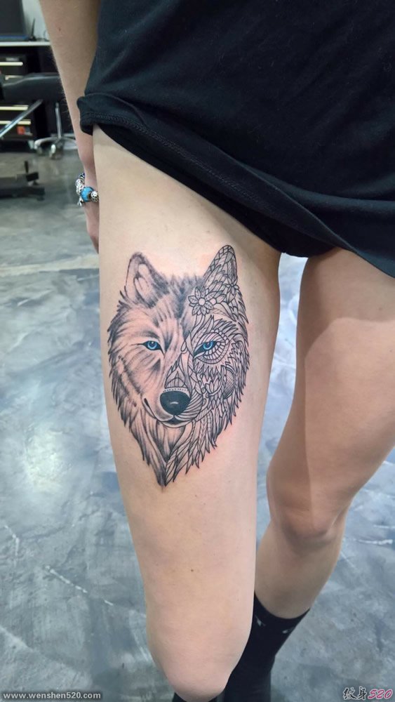 大腿上帅气的半线条半真实狼头纹身图案