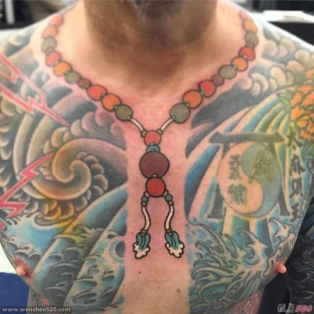 神圣的佛珠项链纹身男人喜欢的吉祥纹身图案