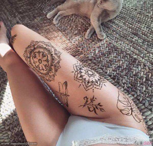 女孩性感大腿上漂亮的装饰风格曼陀罗花纹身图案
