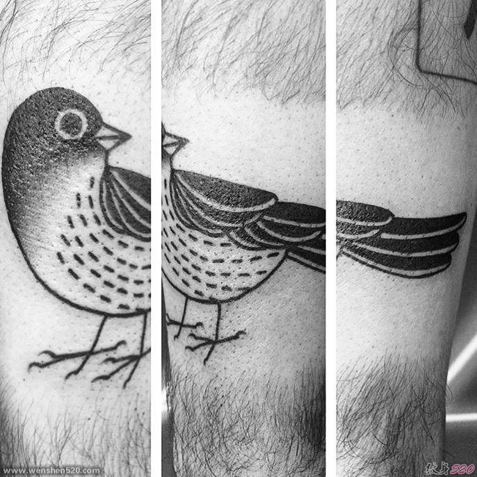 腿部上一只可爱的燕子纹身图片