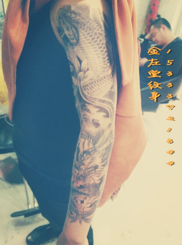 龙与鱼纹身花臂纹身 金左堂纹身盖疤痕修改纹身 安阳纹身 水冶纹身
