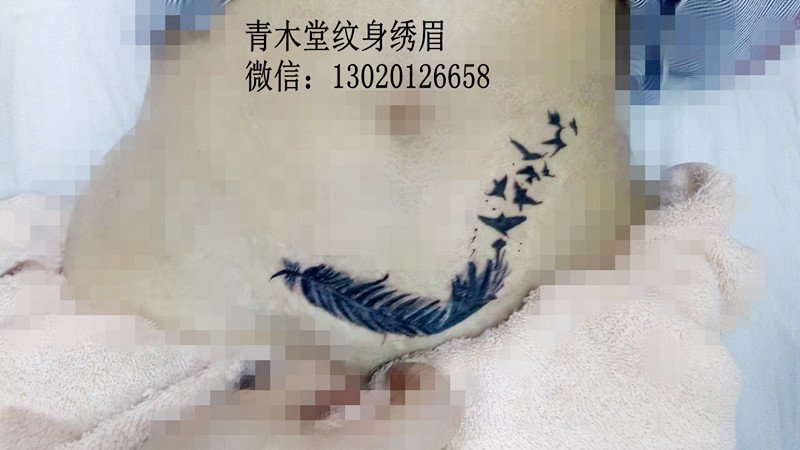 江桥大宅纹身店，羽毛纹身图案。