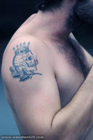 男生手臂上黑色植物素材简单个性骷髅头纹身图片