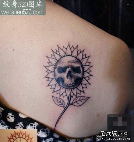 女生背部一张另类经典的骷髅纹身图案