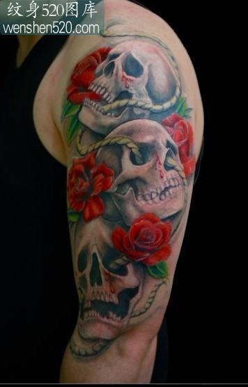 骷髅纹身图案：手臂骷髅玫瑰纹身图案纹身图片