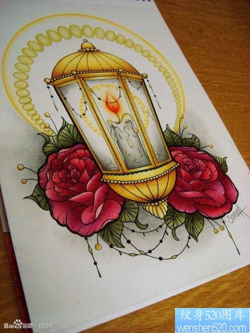 一张流行精美的蜡烛灯玫瑰花纹身图片