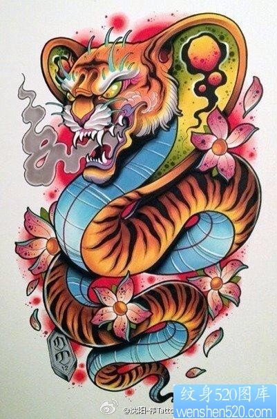 一张很酷流行的虎头蛇纹身图片