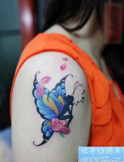美女手臂漂亮的彩色蝴蝶精灵纹身图片