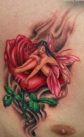 胸部彩色精灵玫瑰纹身图片纹身图案