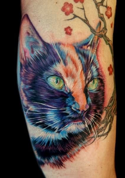 小腿上一款彩色猫咪头像纹身