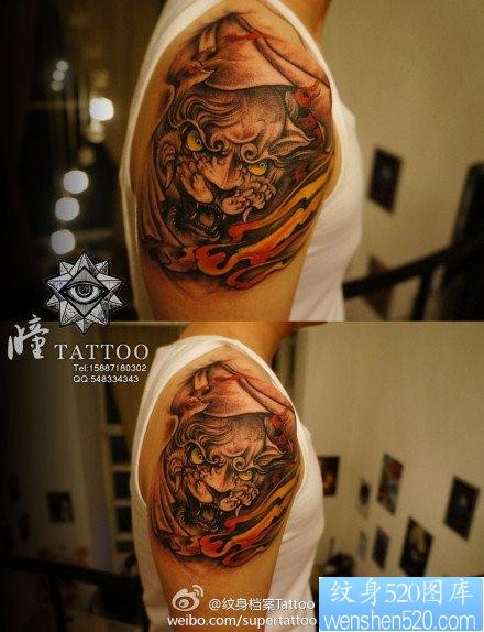 男生手臂霸气的唐狮子纹身图片