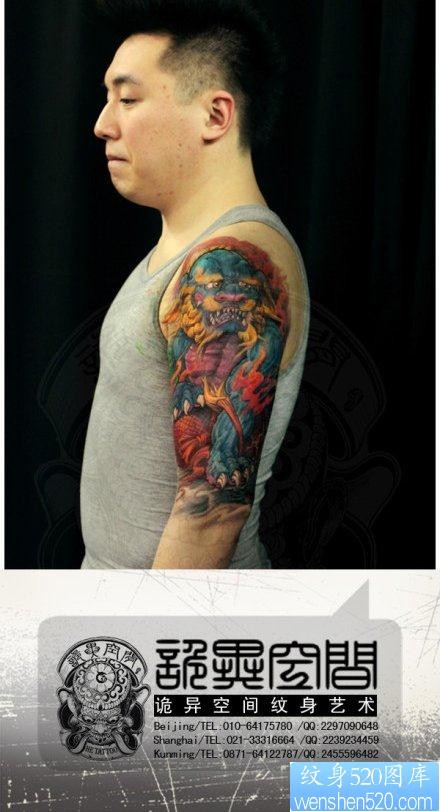 男生手臂帅气超酷的唐狮子纹身图片