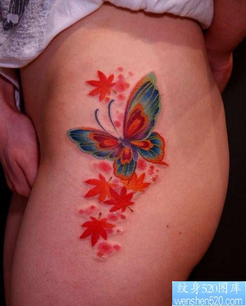 一张美女腿部漂亮的彩色蝴蝶枫叶纹身图片