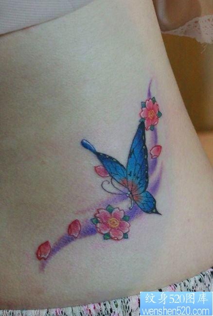美女腰部精美艳丽的蝴蝶与樱花纹身图片