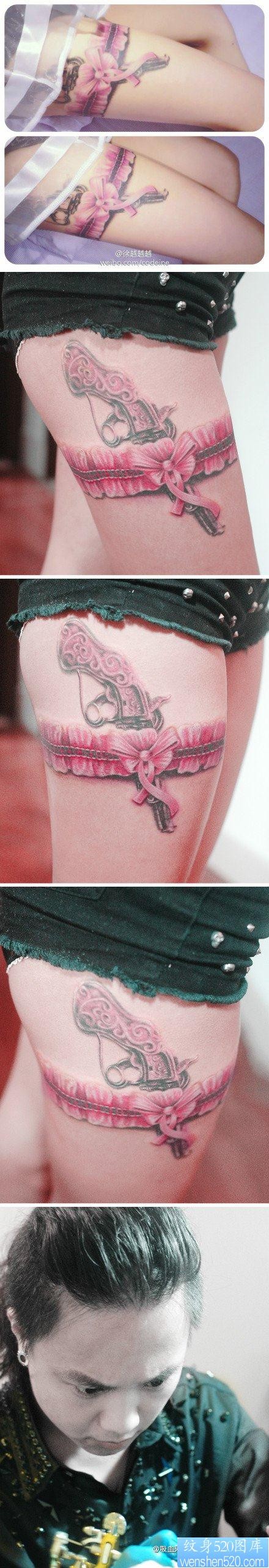 美女腿部流行精美的一张粉色蕾丝与手枪纹身图片