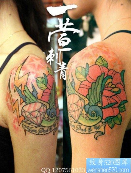 女人手臂漂亮前卫的燕子钻石玫瑰花纹身图片