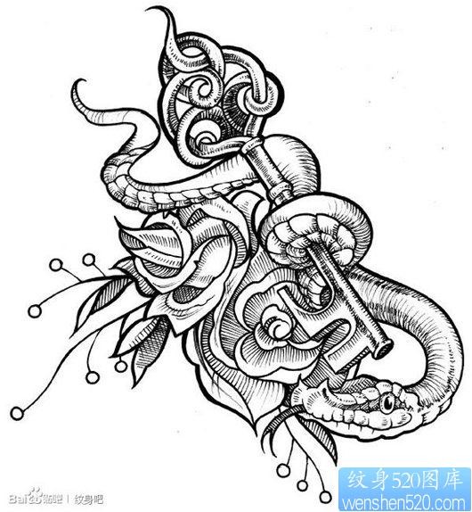 一张前卫经典的蛇与钥匙纹身图片