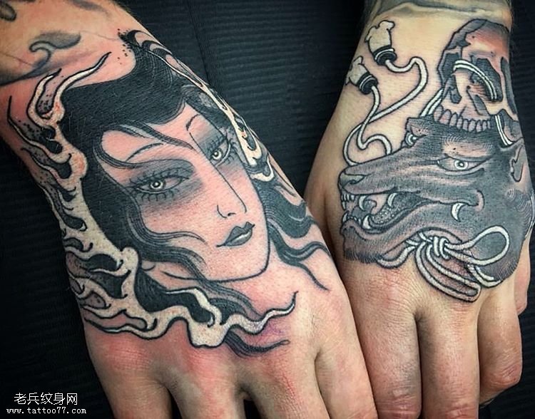 手背艺妓和骷髅纹身图案