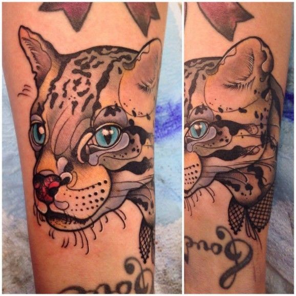 手臂水彩画风格一只野猫纹身图案